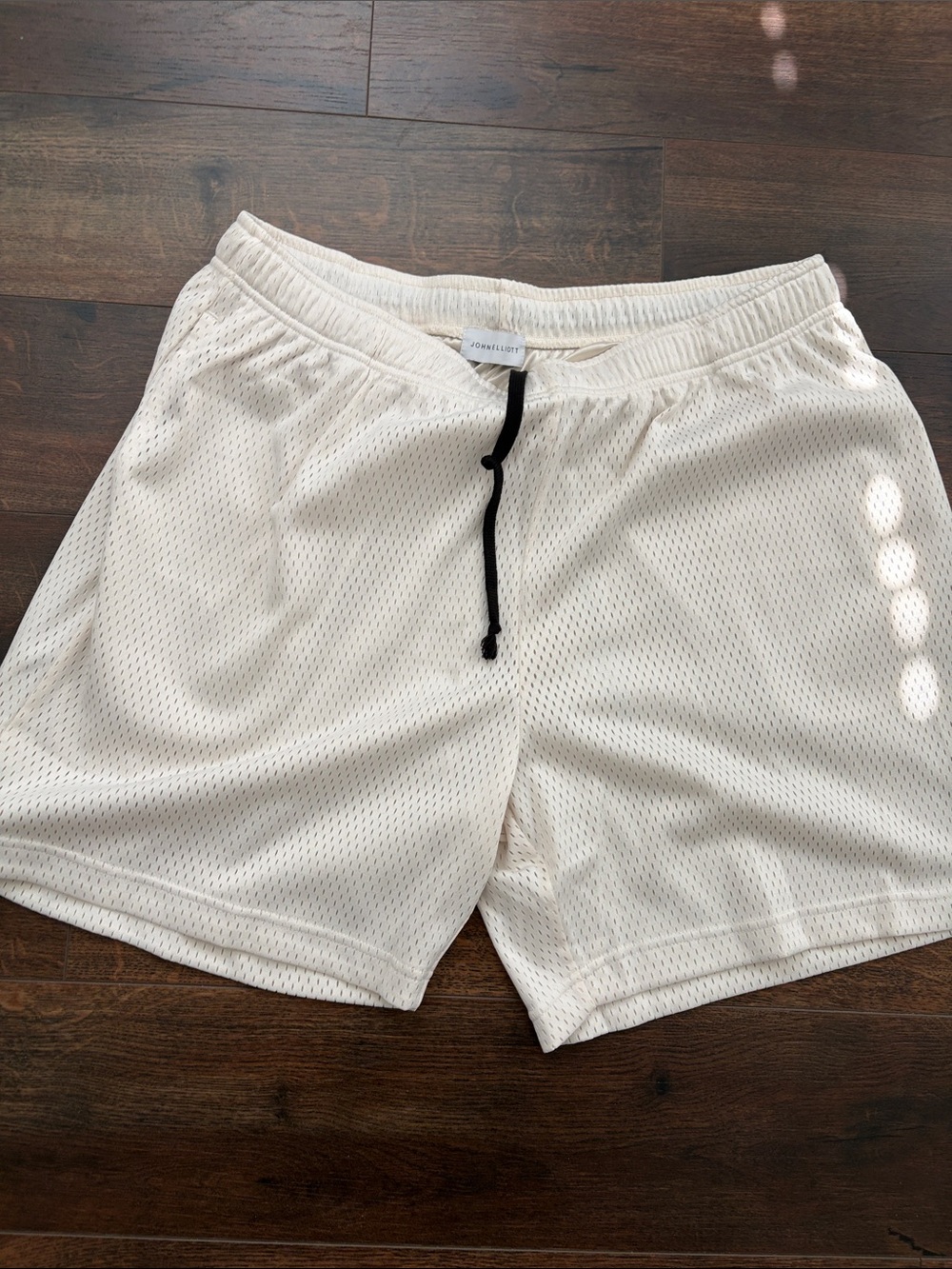 John Elliott Cream Mesh Athletic Shorts with Black Drawcord